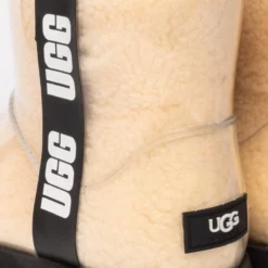 UGG WOMEN'S CLASSIC CLEAR MINI LOGO BOOTIE -AZALEA WANG Shop ugg womens classic clear mini logo bootie natural black 6